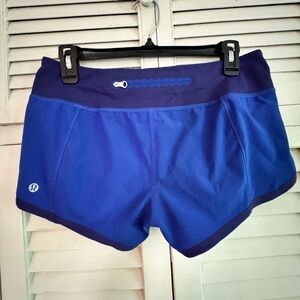 Lululemon vintage style running shorts two-toned blue size 4 EUC unique zipper